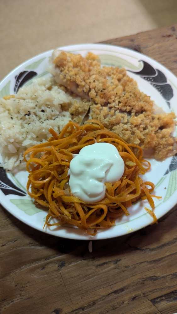 Milford, NH, USA :: Tilapia fillet crusted with a mix of butter, ritz crackers, and shrimp flavored puffs.  Coconut Jasmin Rice.  Sauted shredded Sriracha & hot honey carrots with shallots all topped with whipped goat cheese.